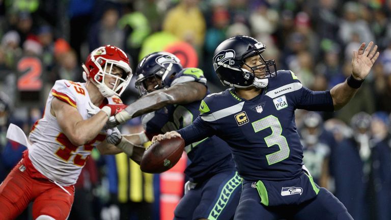 Kansas City, MO, USA. 16th Nov, 2014. Seattle Seahawks quarterback Russell  Wilson (3) calls a play in the huddle during the NFL game between the Seattle  Seahawks and the Kansas City Chiefs