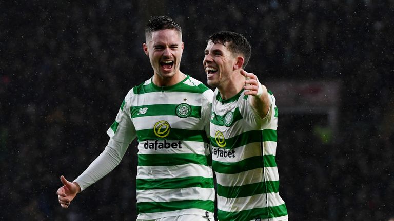 Ryan Christie celebrates his goal for Celtic to make it 4-0 with Mikael Lustig