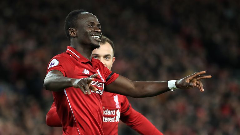 Sadio Mane celebrates scoring Liverpool's third goal