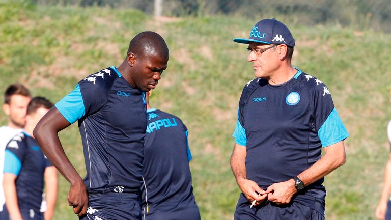 Maurizo Sarri (R) talks with Napoli's French defender Kalidou Koulibaly
