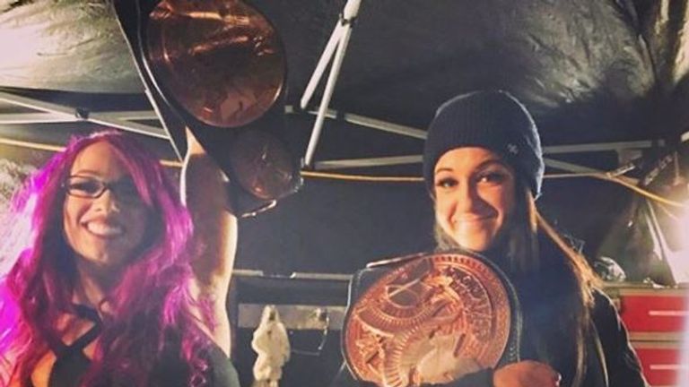 Bayley posted a picture on Instagram of her and Sasha Banks holding WWE tag-team title belts