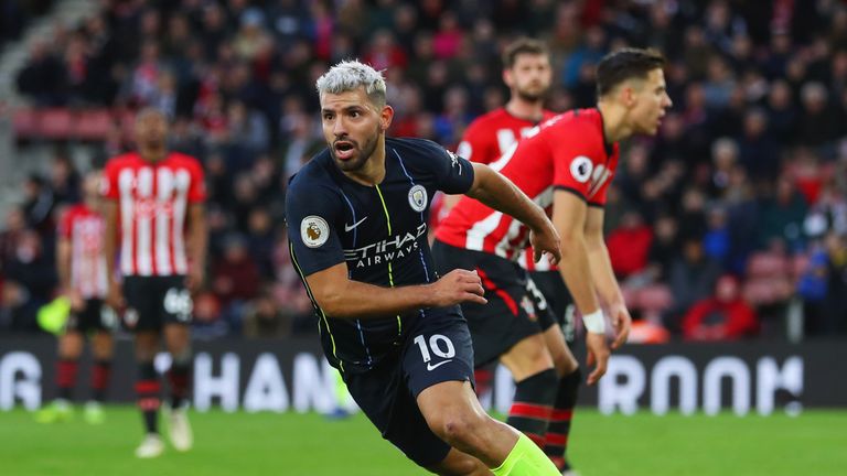 Sergio Aguero turns away from goal in celebration after scoring Manchester City's third goal