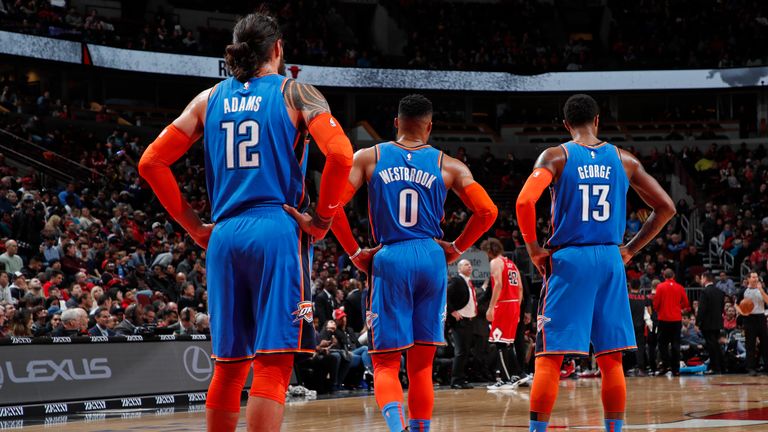 Steven Adams, Russell Westbrook and Paul George of the Oklahoma City Thunder look on during the game against the Chicago Bulls