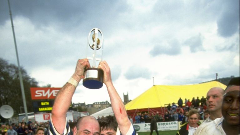 Gareth Chilcott (left) and Stuart Barnes (right) of bath celebrate with the trophy after winning the Courage League in 1992