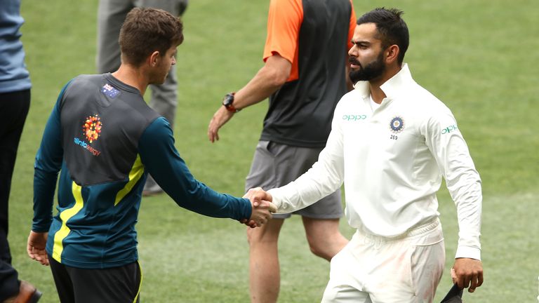 Tim Paine and Kohli shake hands at the end of the Test