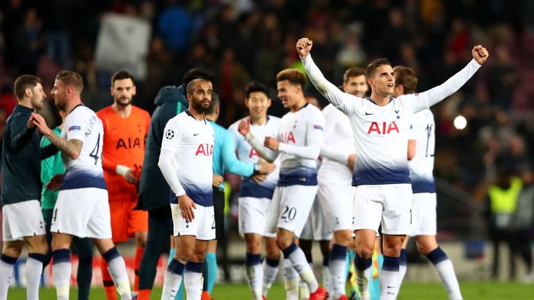Erik Lamela leads Tottenham&#39;s celebrations after the 1-1 draw at Barcelona secured qualification for the last 16 of the Champions League