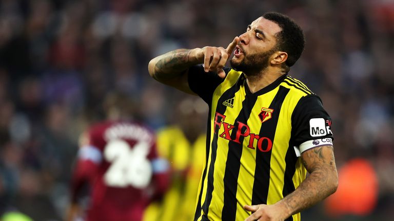Troy Deeney celebrates after putting Watford ahead from the penalty spot