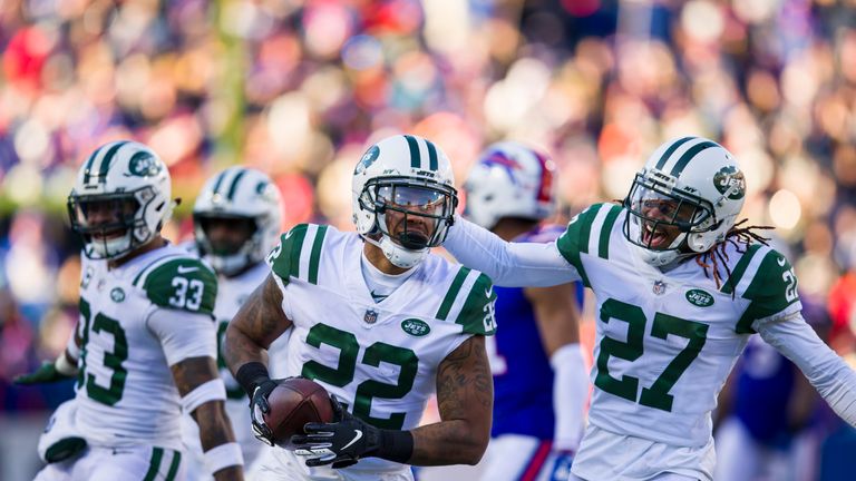 ORCHARD PARK, NY - DECEMBER 09:  Trumaine Johnson #22 of the New York Jets celebrates an interception during the second quarter against the Buffalo Bills at New Era Field on December 9, 2018 in Orchard Park, New York.  (Photo by Brett Carlsen/Getty Images) *** Local Caption *** Trumaine Johnson; Darryl Roberts