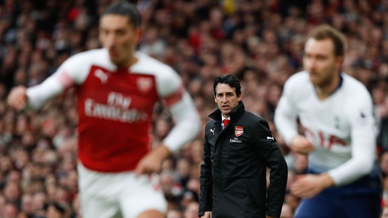 Unai Emery looks on from the touchline