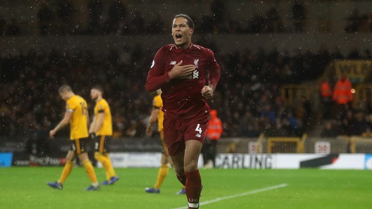 Virgil van Dijk celebrates during the Premier League match between Wolverhampton Wanderers and Liverpool FC at Molineux on December 21, 2018 in Wolverhampton, United Kingdom.