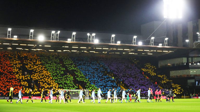 Players and officials walk onto the pitch prior to the Premier League match between Watford FC and Manchester City at Vicarage Road on December 4, 2018 in Watford, United Kingdom.  (Photo by Catherine Ivill/Getty Images)