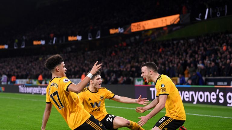 Morgan Gibbs-White, Ruben Vinagre and Diogo Jota celebrate as Wolves beat Chelsea 2-1
