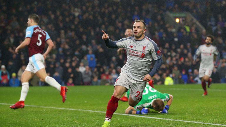 Xherdan Shaqiri celebrates scoring Liverpool's third goal