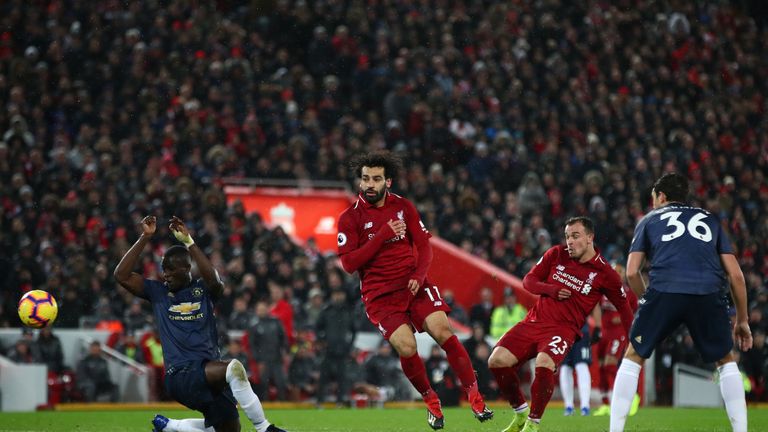 Xherdan Shaqiri scores Liverpool's third goal at Anfield