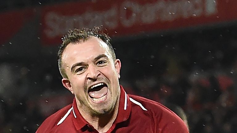 Xherdan Shaqiri celebrates after scoring Liverpool's third goal against Manchester United