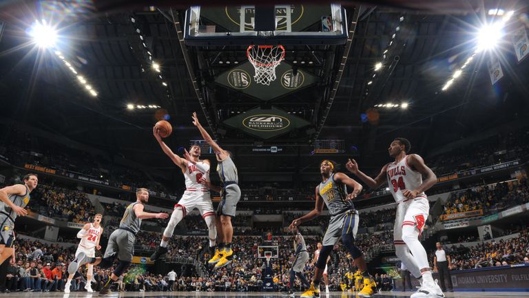 Zach LaVine #8 of the Chicago Bulls shoots the ball against the Indiana Pacers on December 4, 2018 at Bankers Life Fieldhouse in Indianapolis, Indiana.