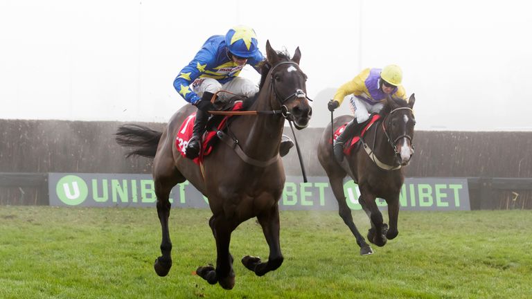 Dynamite dollars ridden by Harry Cobden on the way to winning the 32Red.com Wayward Lad Novices' Chase.