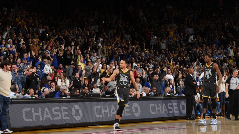 Stephen Curry celebrates his game-winning basket