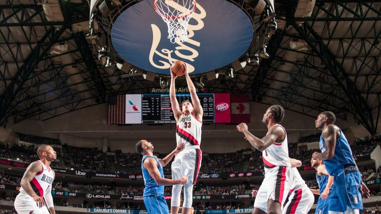 Zach Collins #33 of the Portland Trail Blazers shoots the ball against the Dallas Mavericks on December 4, 2018 at the American Airlines Center in Dallas, Texas