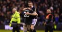 Harris praises character of players