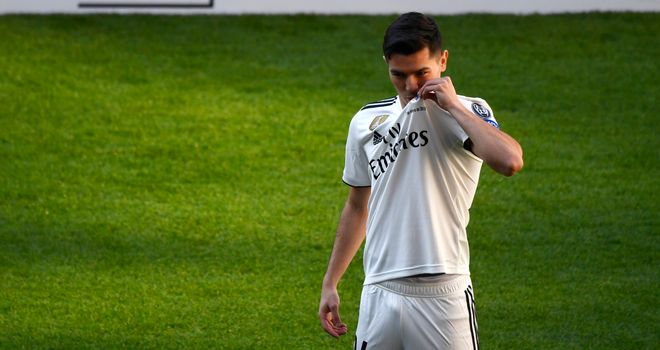 Brahim poses in the Real Madrid jersey