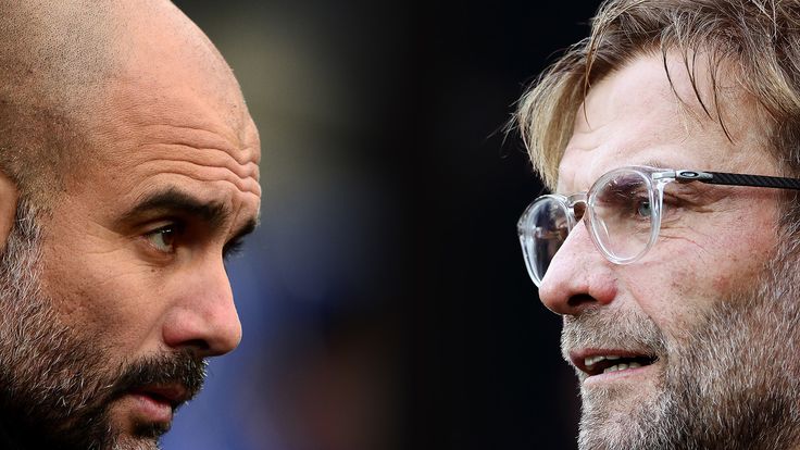 Guardiola, Manager of Manchester City (L) and Liverpool manager Jurgen Klopp. Manchester City and Liverpool FC meet in a Premier League fixture at the Etihad Stadium on January 3, 2019 in Manchester.