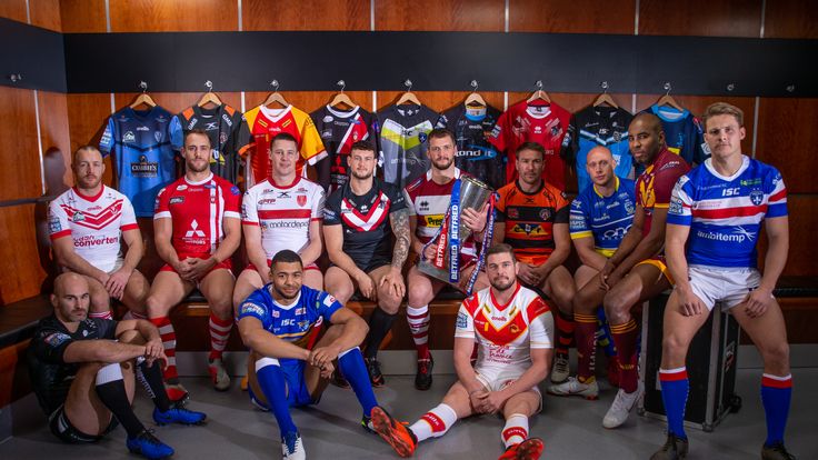 Picture by Allan McKenzie/SWpix.com - 24/01/2019 - Rugby League - Betfred Super League Launch 2019 - Old Trafford, Manchester, England - Betfred Super League captains with the Betfred League trophy - (l-r) Danny Houghton, James Roby, Lee Mossop, Joel Tomkins, Jay Pitts, Sean O'Loughlin, Remi Casty, Michael Shenton, Chris Hill, Michael Lawrence & Jacob Miller.