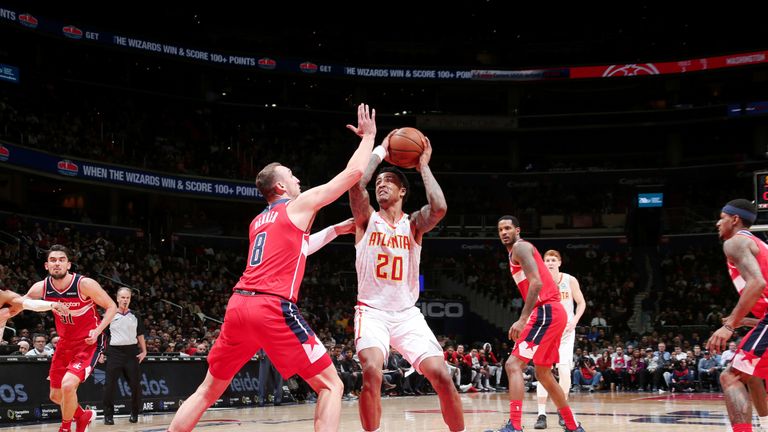 John Collins attacks the Washington interior defense