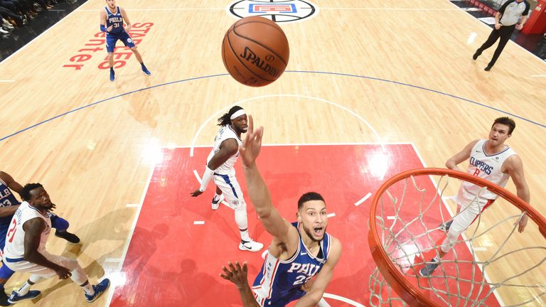 Ben Simmons lofts a floater at the rim