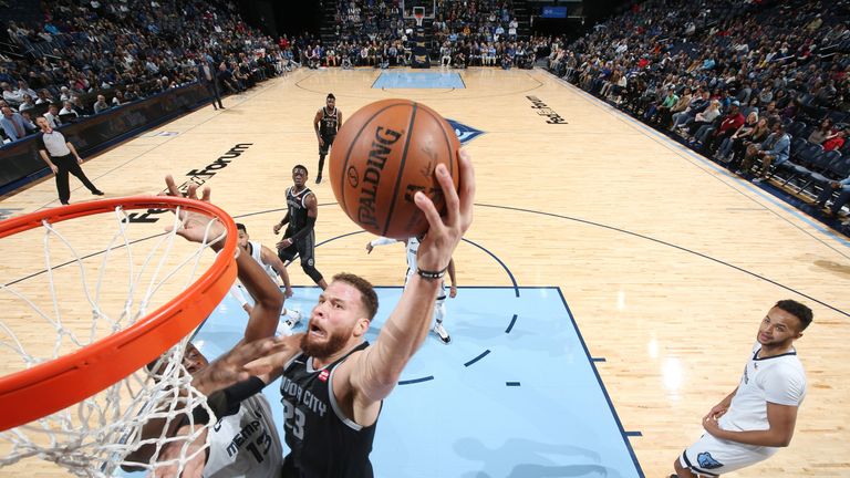 Blake Griffin finishes at the rim against Memphis