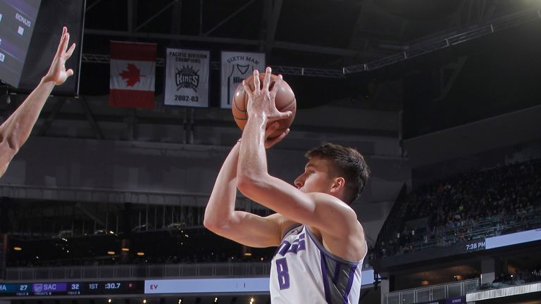 Sacramento Kings wing Bogdan Bogdanovic drills one from three-point range