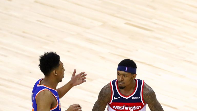 Bradley Beal flexes during Washington's win over New York at The O2