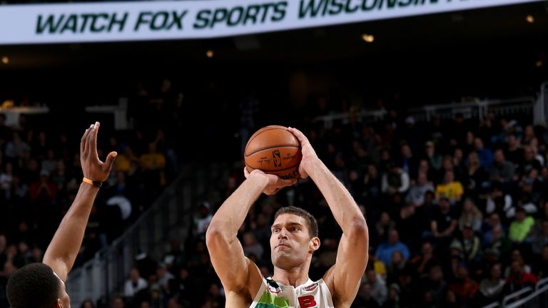 Brook Lopez fires from beyond the arc against Detroit