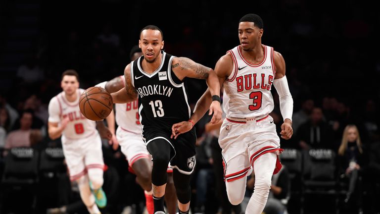 Shabazz Napier dribbles down the court