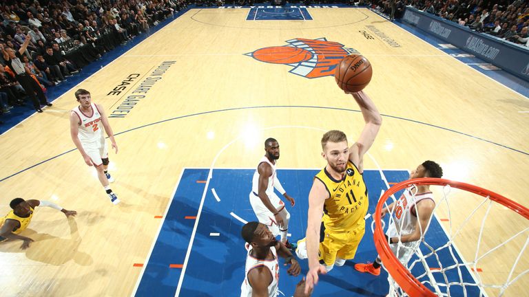 Domantas Sabonis dunks against the New York Knicks