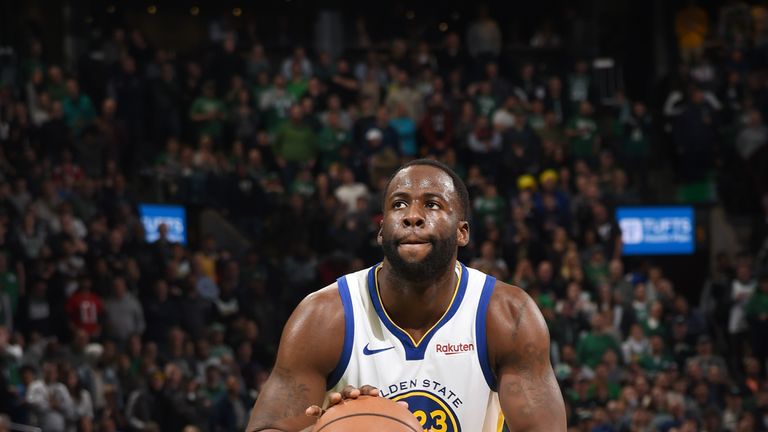 Draymond Green shoots from the free throw line