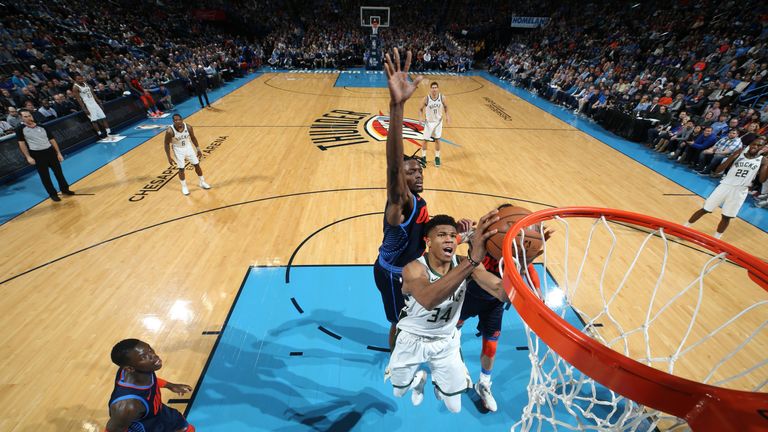 Giannis Antetokounmpo shows off his incredible leaping ability to finish over the Thunder defence
