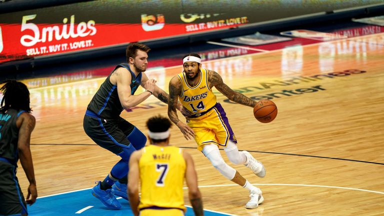 Brandon Ingram of the Los Angeles Lakers handles the ball against the Dallas Mavericks