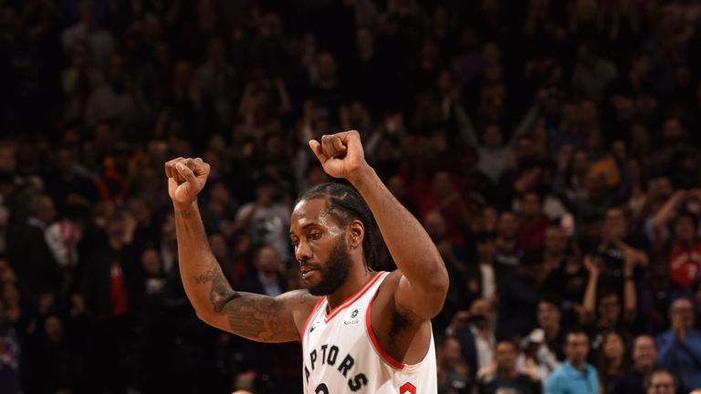 Kawhi Leonard salutes the crowd in Toronto