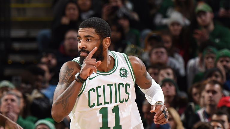 Kyrie Irving celebrates a scoring play against Miami