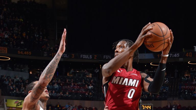 Josh Richardson looks to pass against the Cleveland Cavaliers