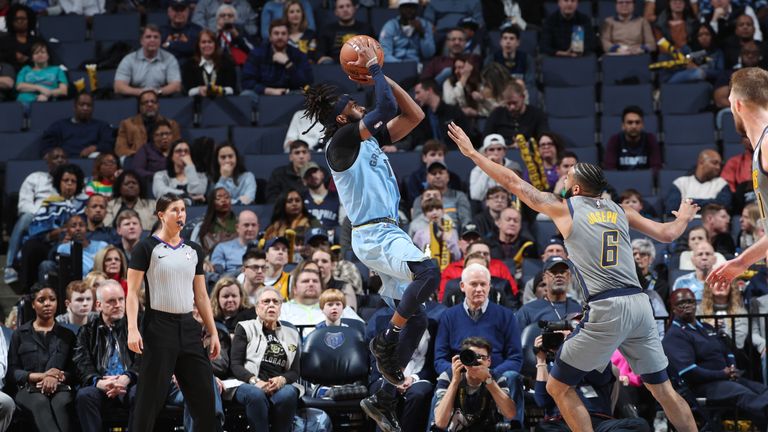 Mike Conley takes a shot against the Pacers