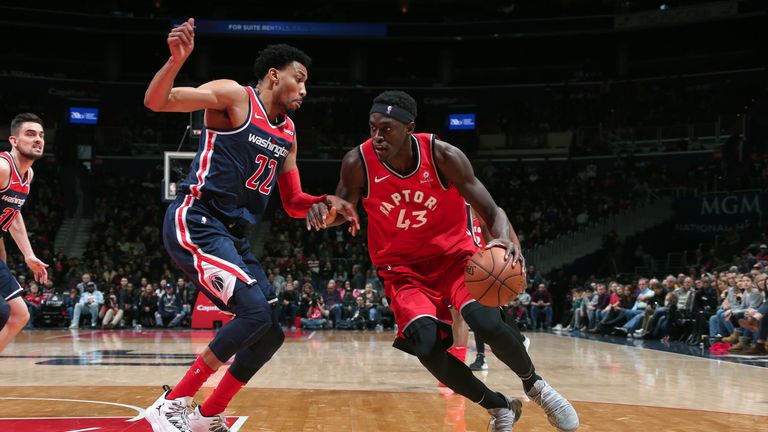 Pascal Siakam attacks the Washington defense