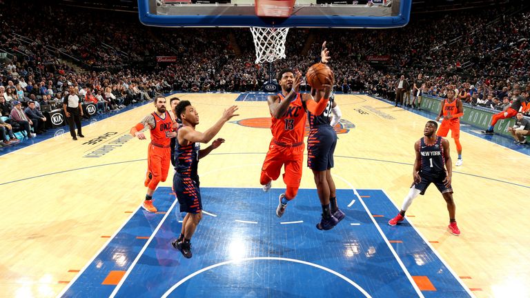 Paul George attacks the basket against the New York Knicks