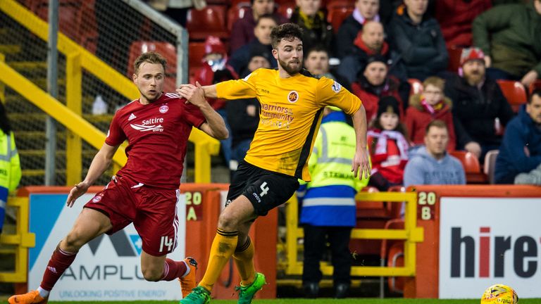 Aberdeen's Greg Stewart (L) battles with Stenhousemuir's Morgyn Neil.

