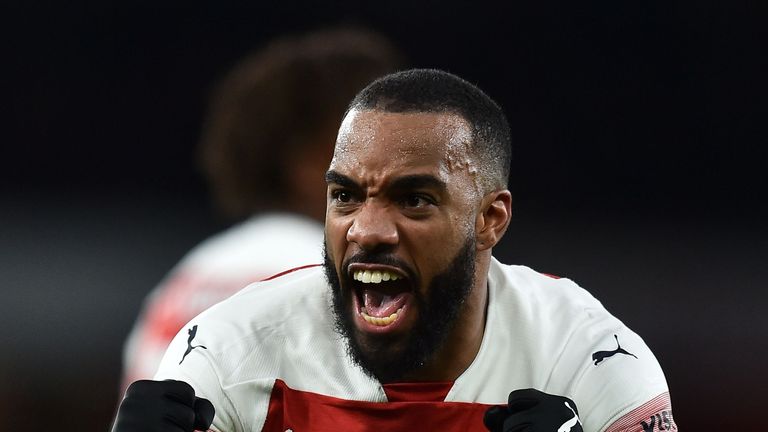 Alexandre Lacazette celebrates after doubling Arsenal's lead