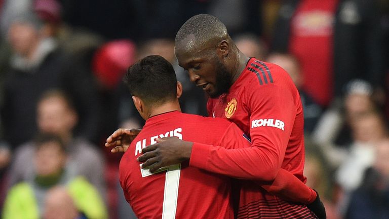 Romelu Lukaku celebrates with Alexis Sanchez