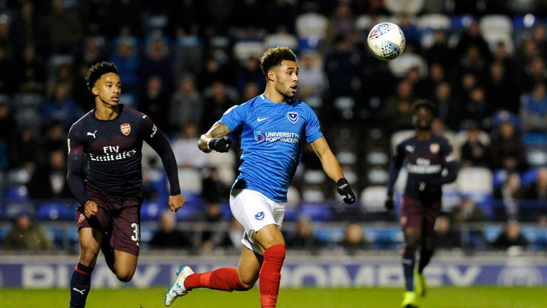 Andre Green struck in the final minute of added time to send Portsmouth into round four