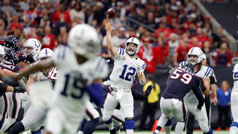 Andrew Luck of the Indianapolis Colts throws a pass in the second quarter against the Houston Texans during the Wild Card Round