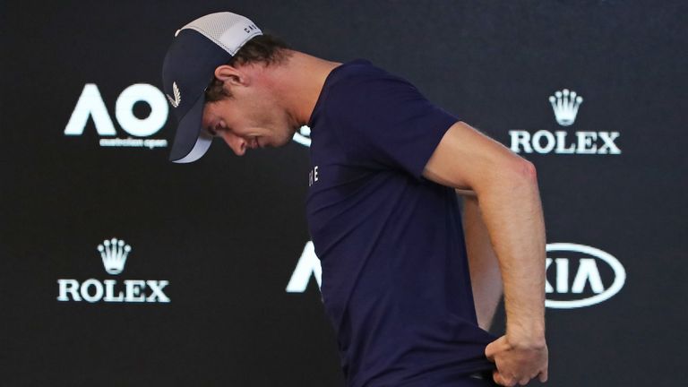 An emotional Murray walked out of his press conference before returning to reveal his retirement plans
